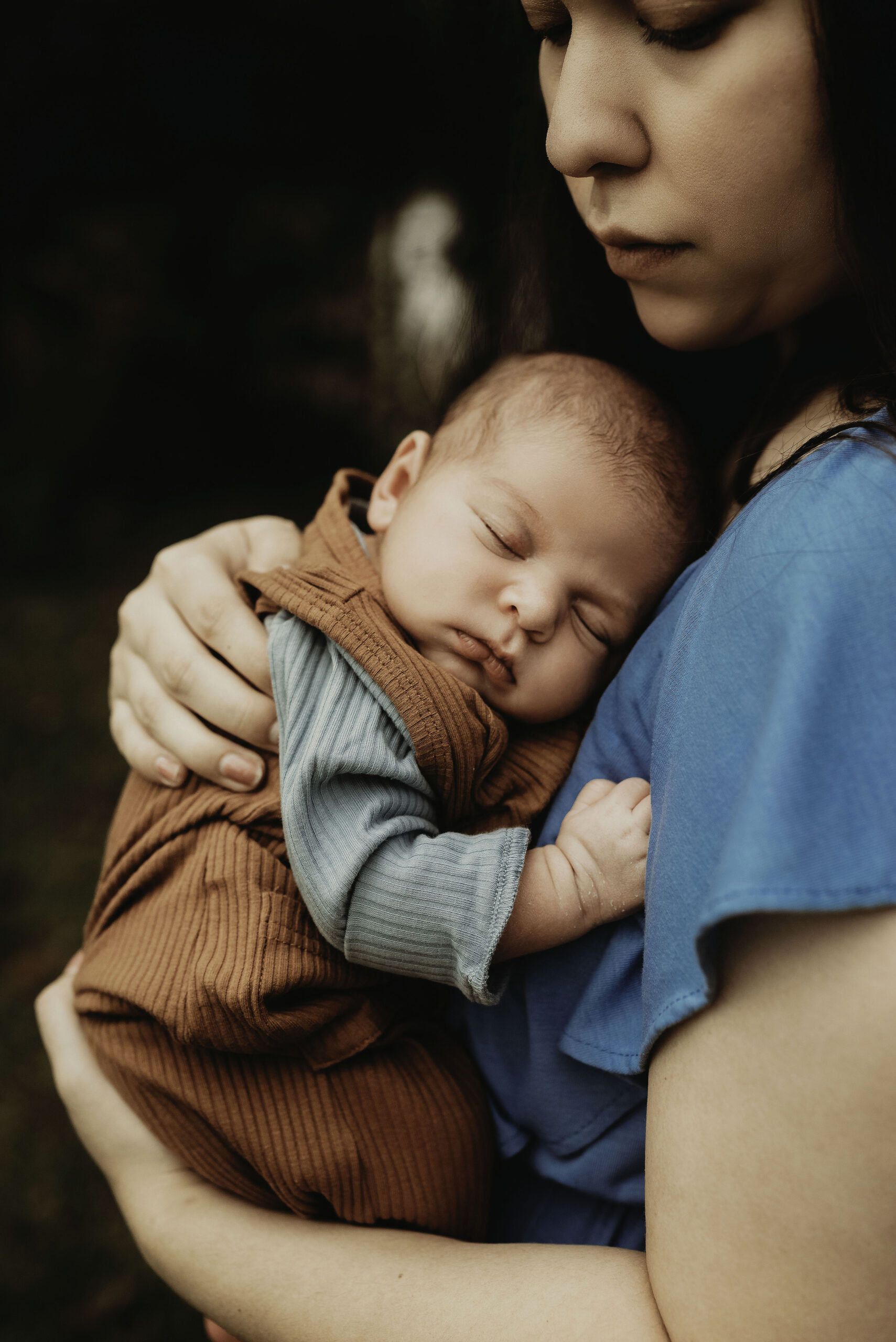 mother holding newborn close - Jennifer Duke Photography, Brazoria County Photographer